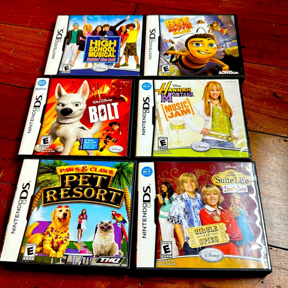6 Nintendo DS Games with the original case and books